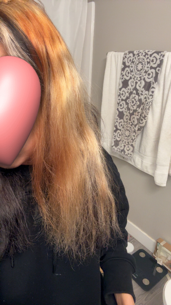 How can I fix my orange roots to a honey golden blonde without re-bleaching?