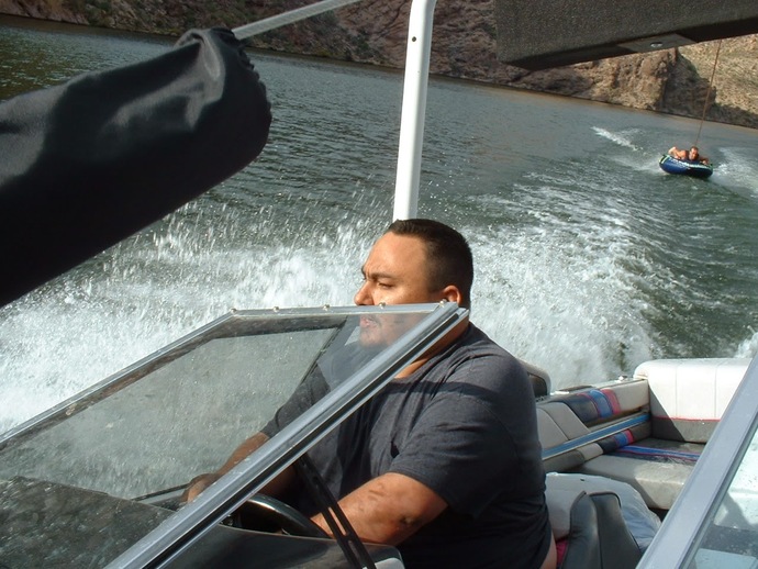 Me towing my buddy on a tube at a lake outside of Phoenix, AZ.
