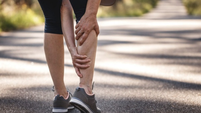 How can I prevent and relieve leg cramps after a few miles of jogging?