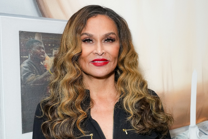 Why does Tina Knowles identify as Black despite her ambiguous appearance?
