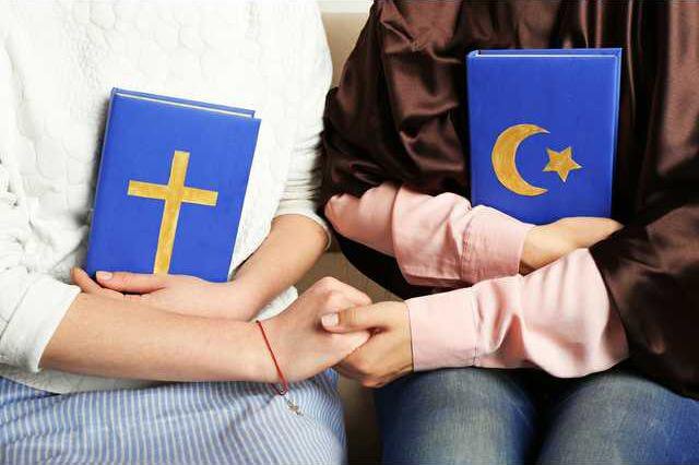 generic picture of two people holding hands