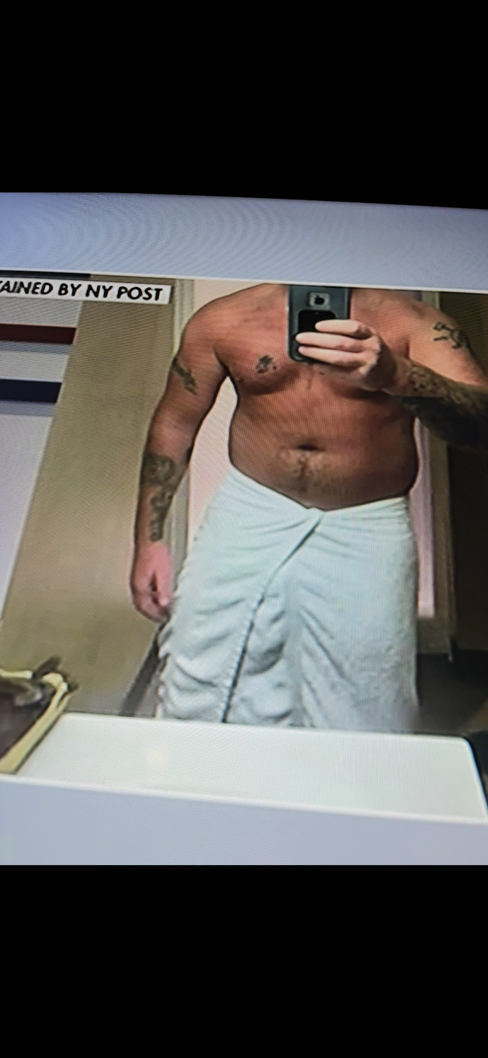 Where exactly is the Nazi tattoo located on his chest?