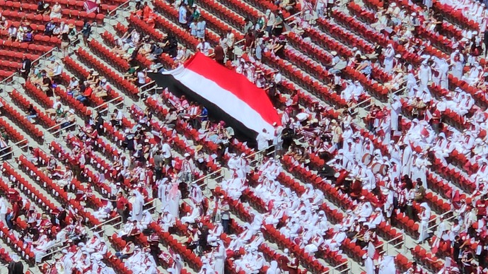 Why do some fans wear THEIR colors and bring THEIR flag to other countries matches? Does anyone else hate this and find it disrespectful?