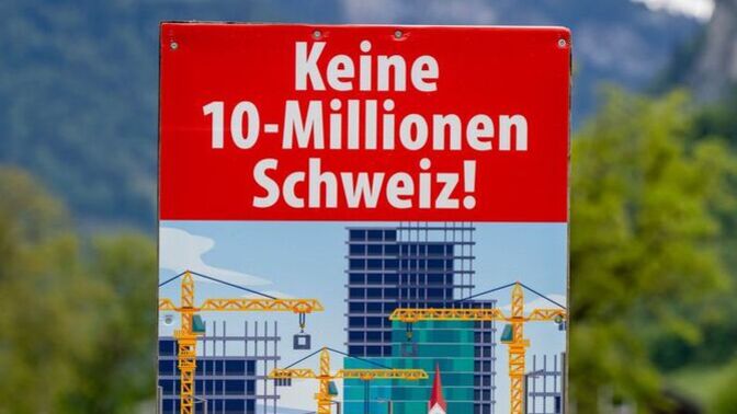 Why did Switzerland vote against capping it's population?
