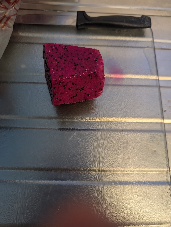 Harvested my first homegrown dragon fruit today—how does it look?