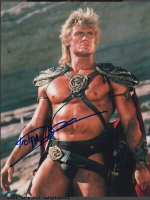 Which of these bare chested buff barbarian dudes from the 80s do you like the look of most?