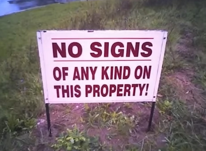 If you take this sign, is it actually theft or just following instructions?
