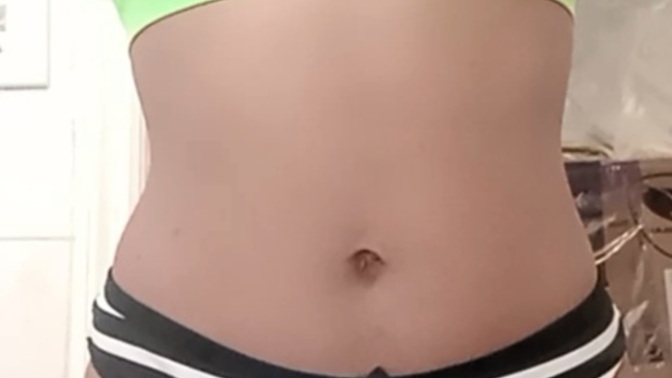 How would you accurately describe her body shape based on this?