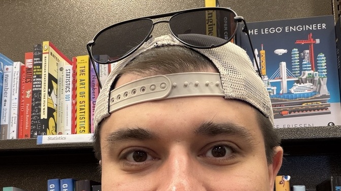 Does wearing a backwards hat actually make guys more attractive?