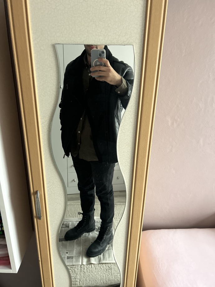 Can I wear a black biker outfit on a date without looking like a bad boy?