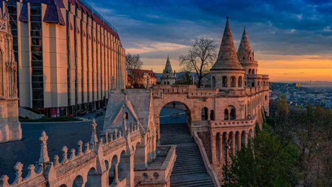 Would you rather visit Budapest or Minsk, and why?