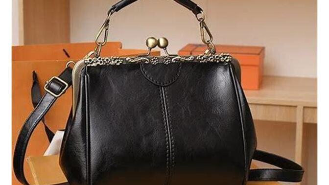 For everyday outfits, should I buy the black or brown Coach kisslock bag first?