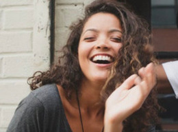 What do you think this girl is laughing about? Funny answers only?
