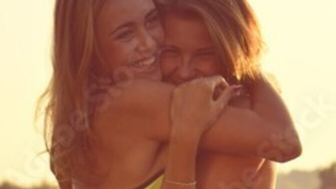 Is it normal for women to hug their female friends while both of them are in bikinis?