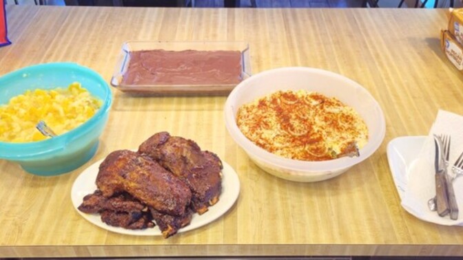 Are BBQ ribs better as an outdoor meal or an indoor meal?