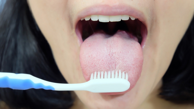 When you brush your teeth, do you also clean or brush your tongue?
