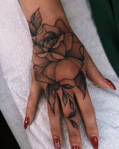 I'm thinking of getting a small minimalist tattoo on my hand but I don't want it to be too tiny Any ideas?