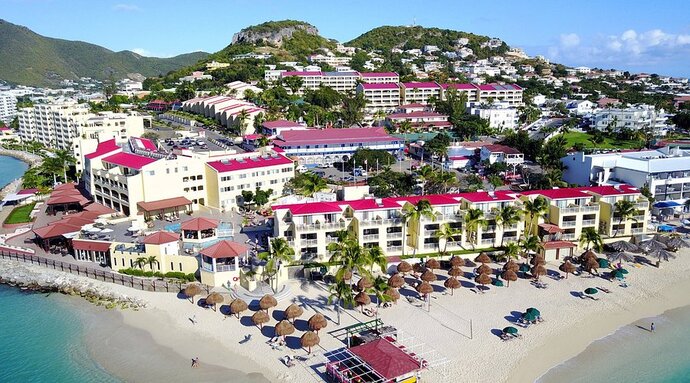 Should I be selfish and drag my aging travel partner to see real St. Barths cultutre, or be considerate and go to Hawaii?