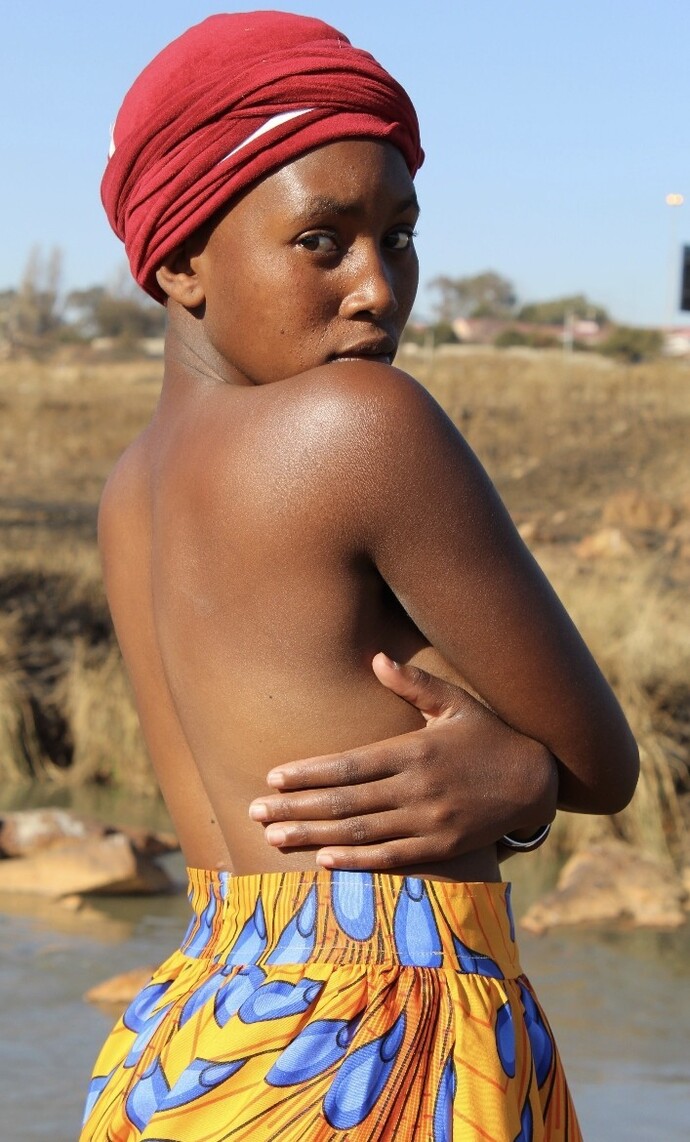 Should it be socially normal for women to go topless in public like men?