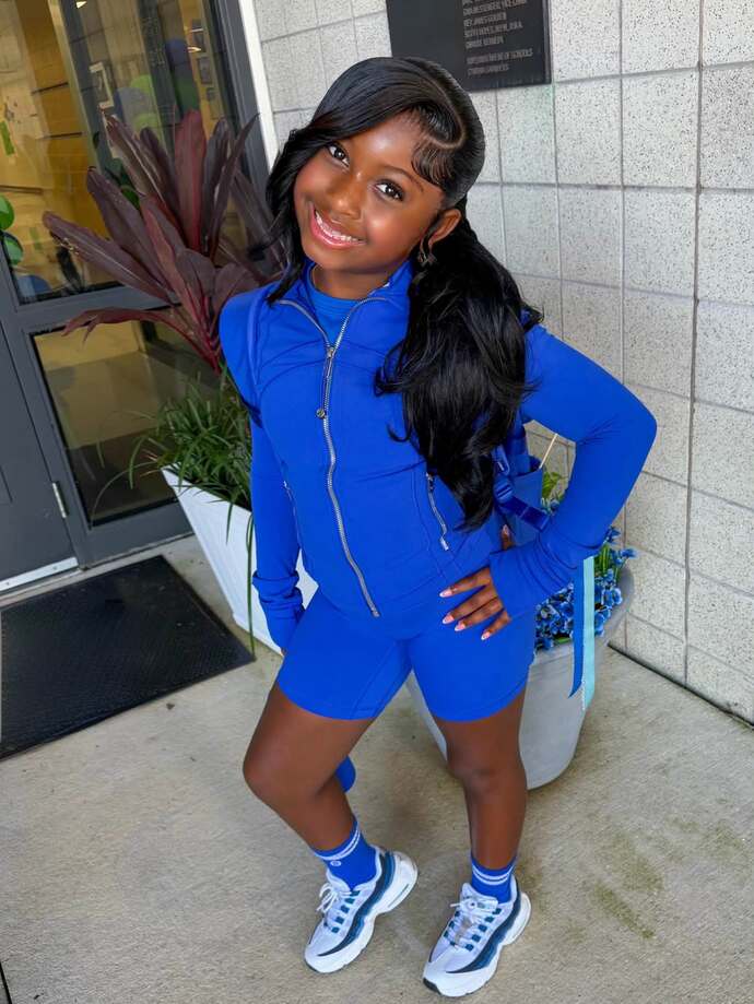 What do you think of this 2nd grader wearing a lace front wig to school?