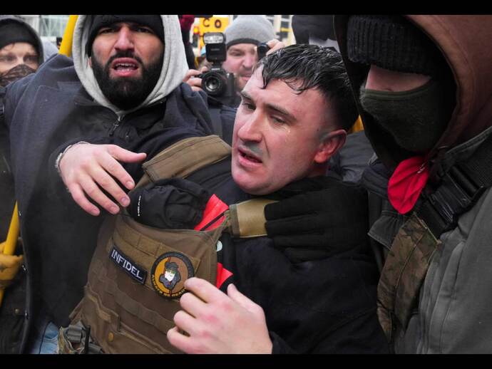 Jake Lang in tears, right after he p**d his pants, in Minneapolis, last January.