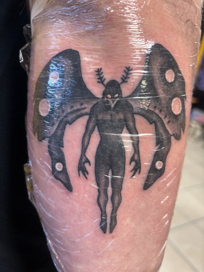 Do you like my new moth man tattoo?
