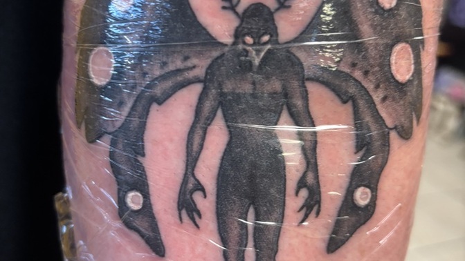 Do you like my new moth man tattoo?