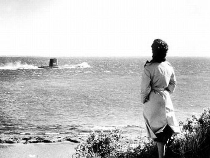 Moira staring out to sea as the Sawfish sets off on one final futile mission from which there will be no return.