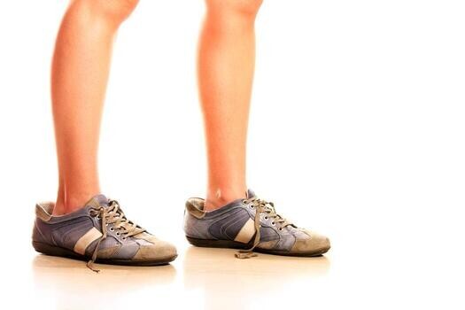 Why would someone intentionally wear oversized shoes?