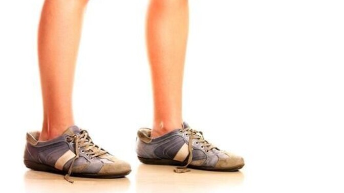 Why would someone intentionally wear oversized shoes?