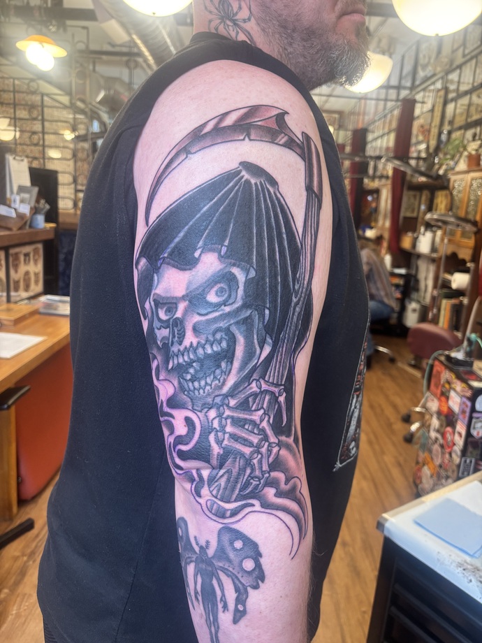 Like my grim reaper tattoo?
