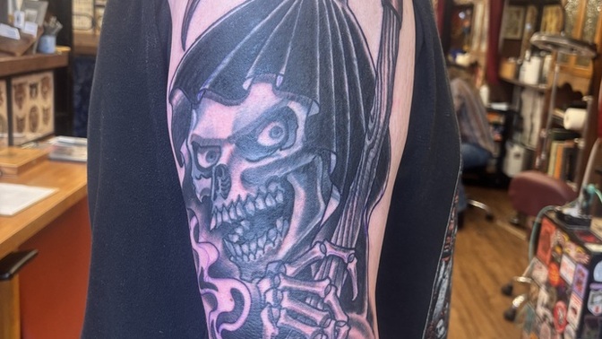 Like my grim reaper tattoo?