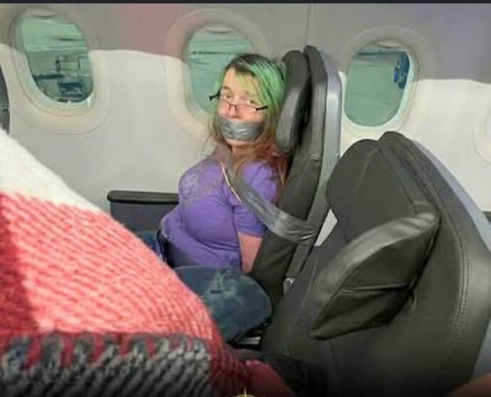 Is duct taping passengers a violation of their free speech rights?