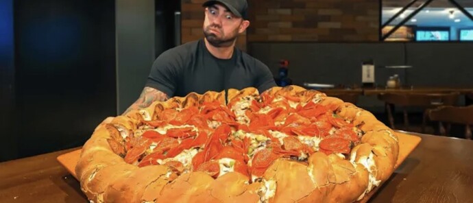 Would you take on a 14-pound pizza challenge for the right cash prize?
