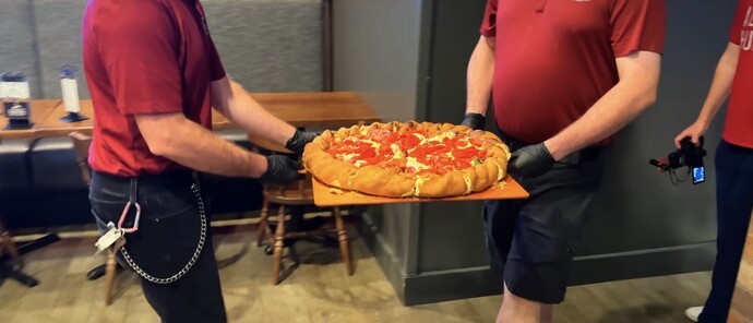 Would you take on a 14-pound pizza challenge for the right cash prize?
