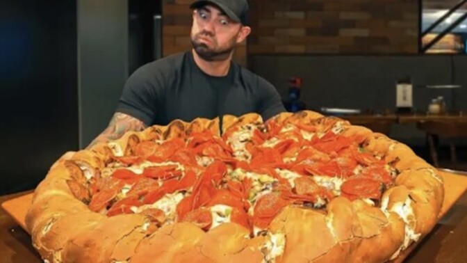 Would you take on a 14-pound pizza challenge for the right cash prize?