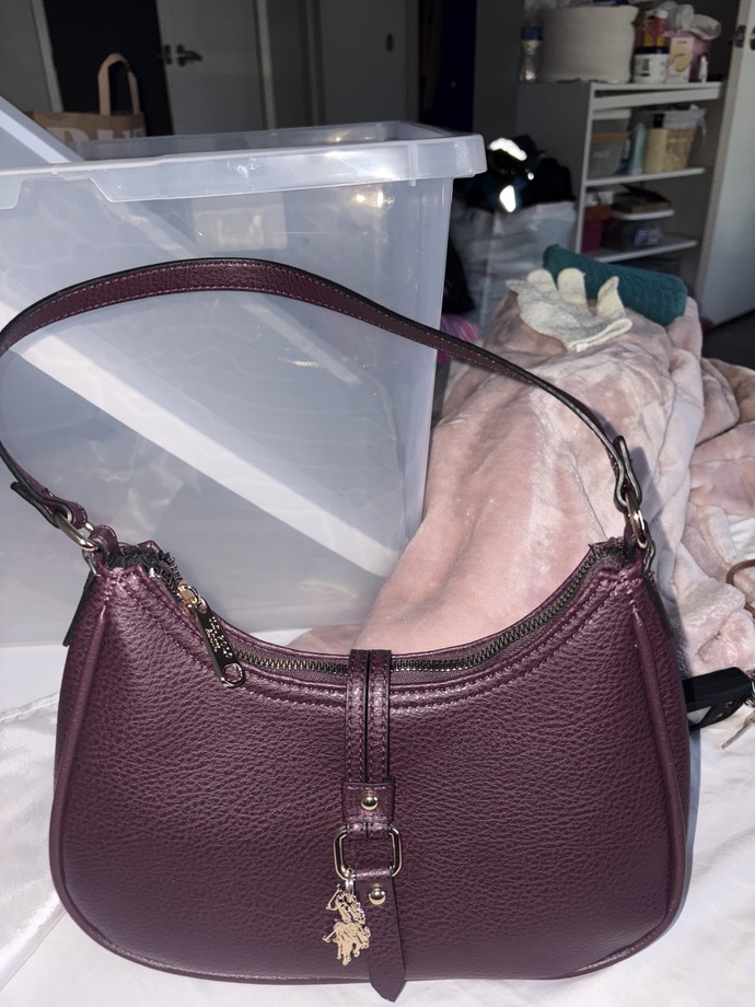 Is this purse cute or ugly, and should I return it for a white one?