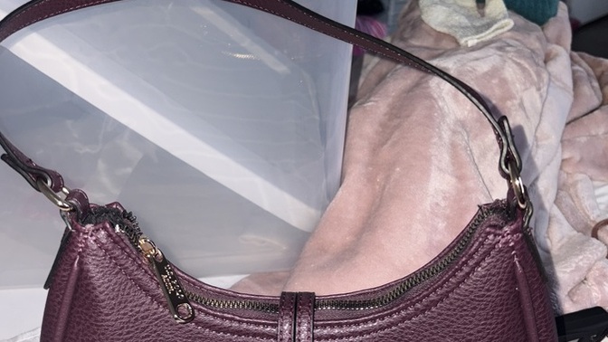 Is this purse cute or ugly, and should I return it for a white one?