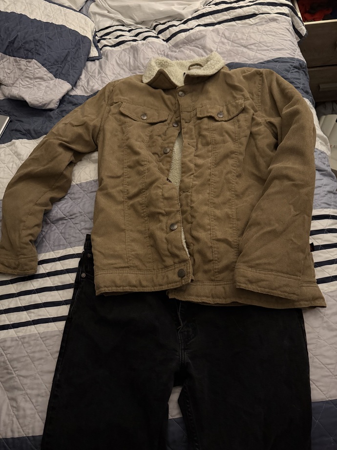 Which outfit works better for a first date with black jeans?