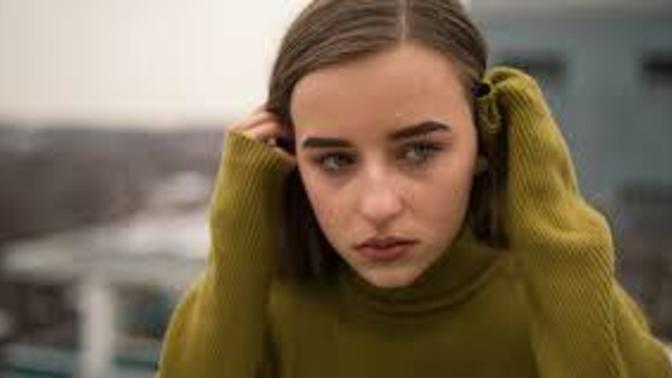 Girl stares at me without smiling or looking away?